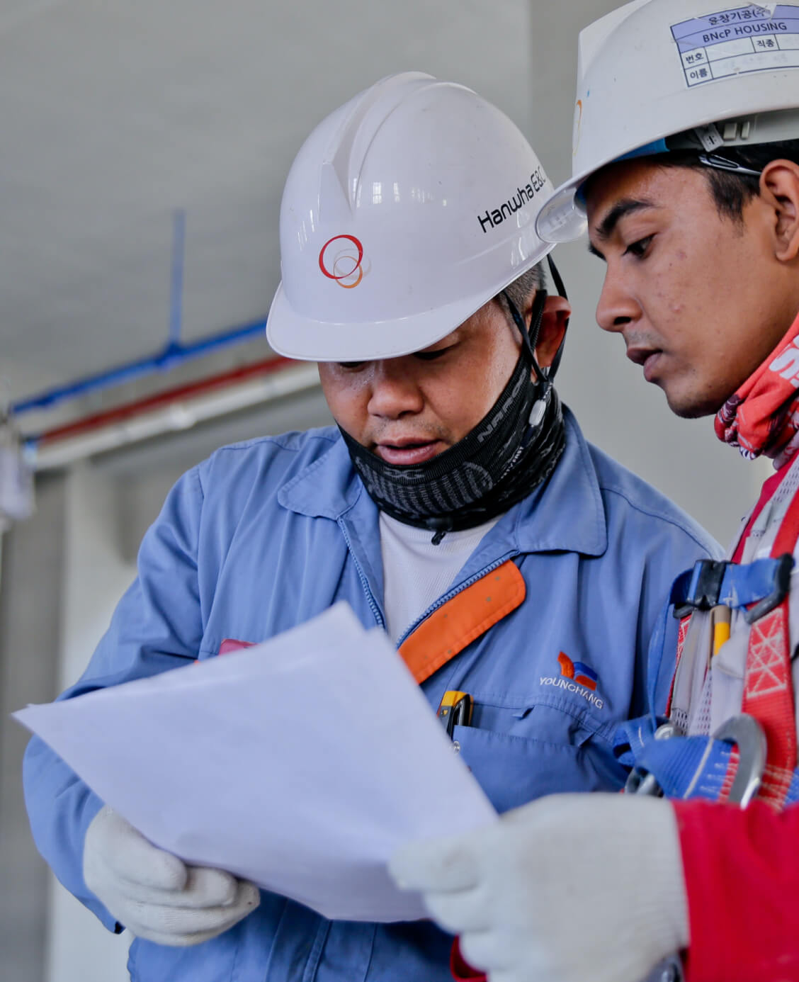 Man reading blueprints